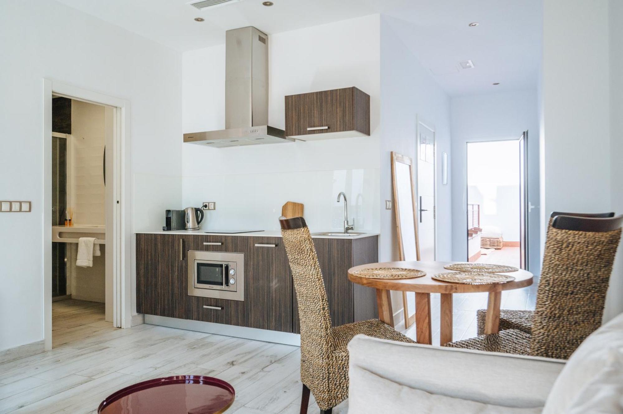Apartamentos "El Escondite De Triana" Севилья Экстерьер фото