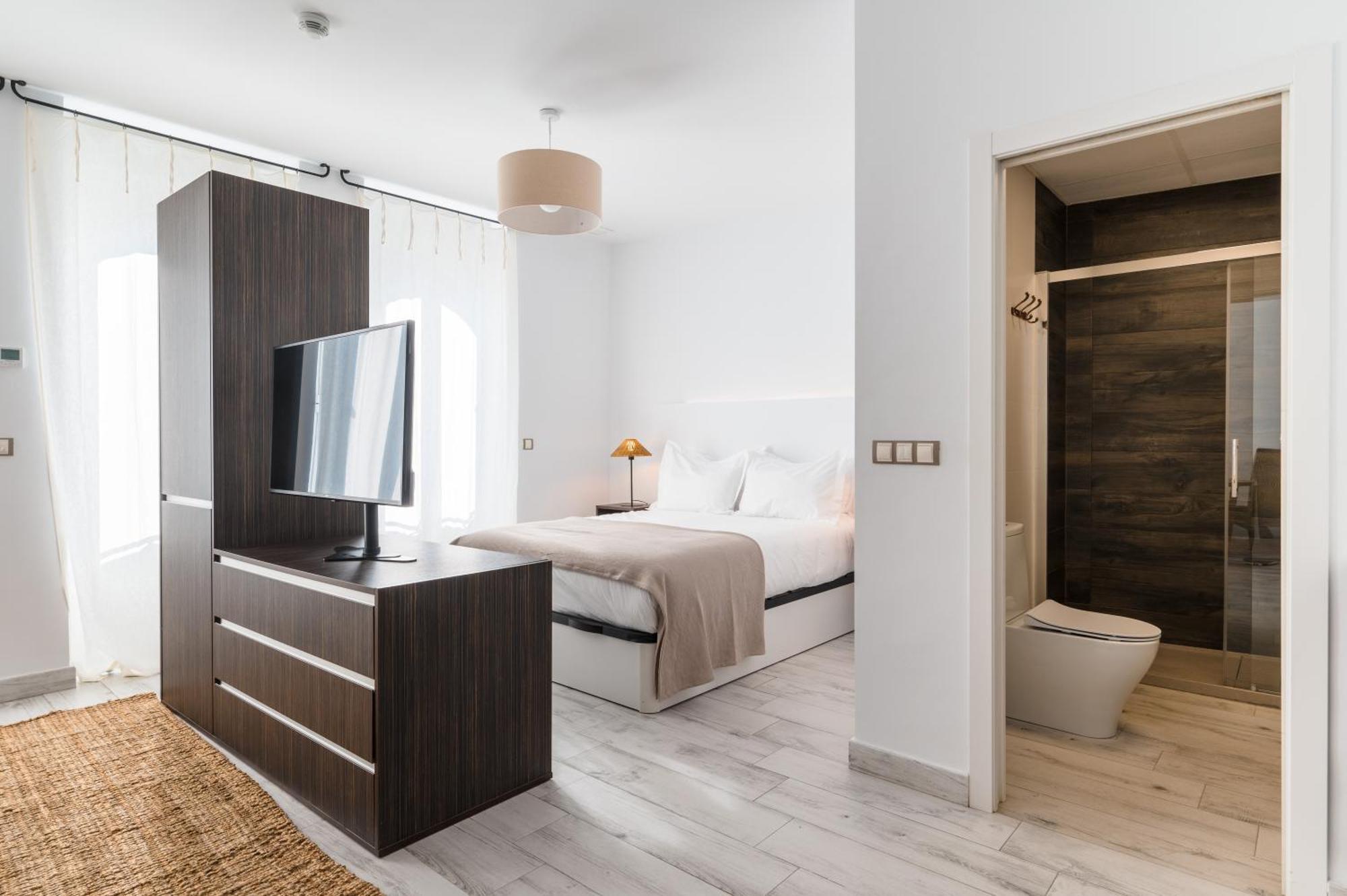 Apartamentos "El Escondite De Triana" Севилья Экстерьер фото