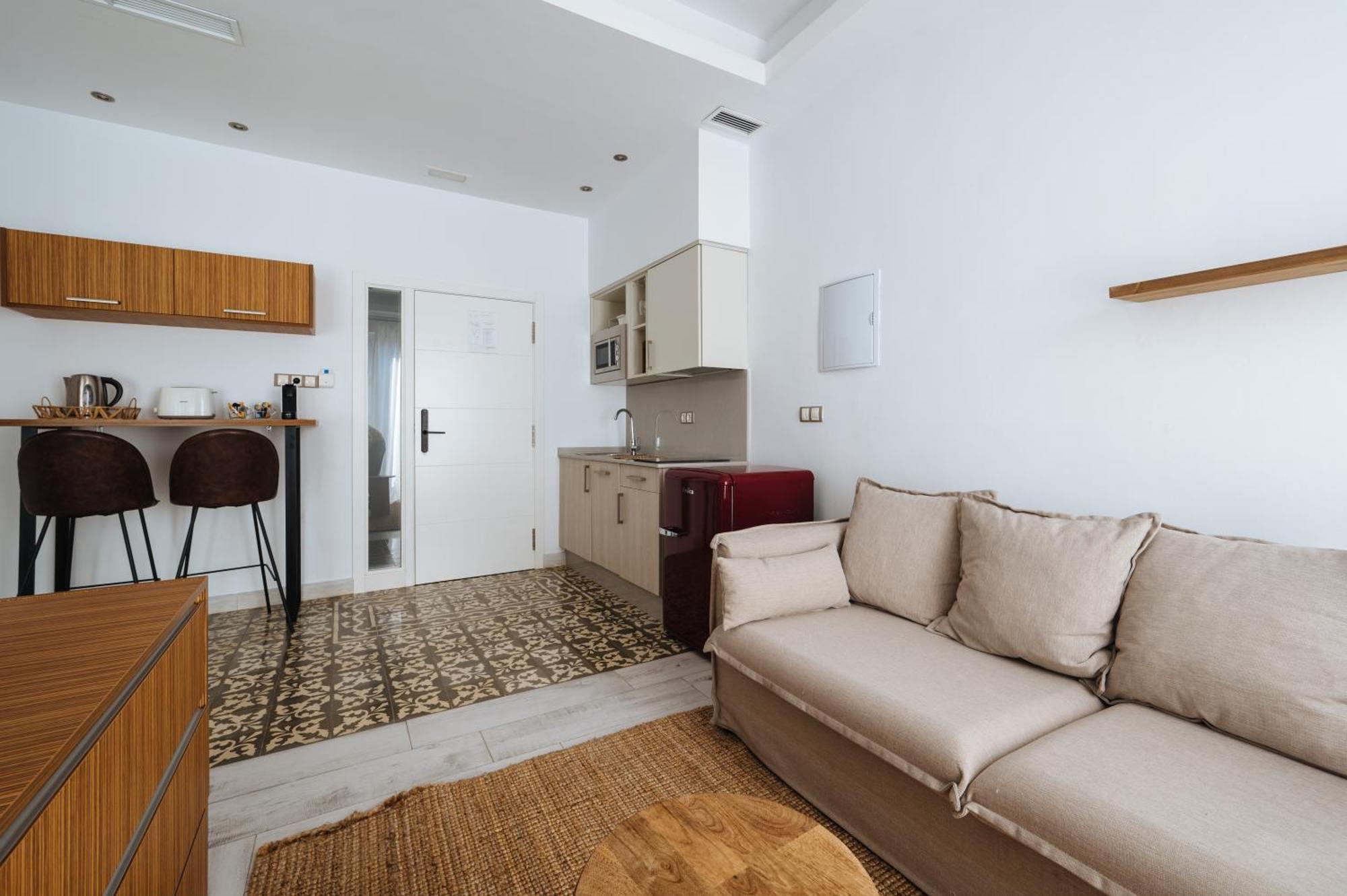 Apartamentos "El Escondite De Triana" Севилья Экстерьер фото
