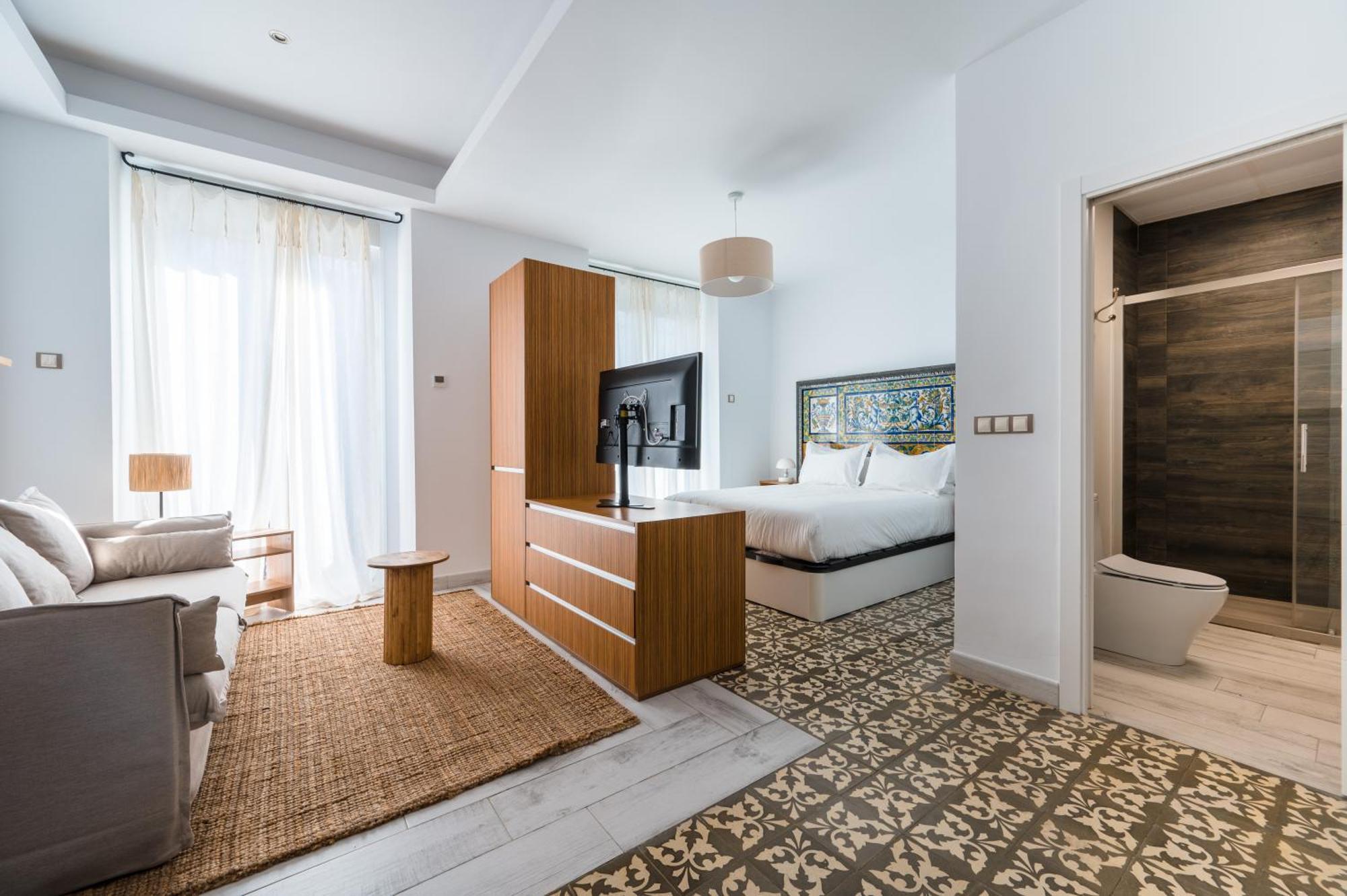Apartamentos "El Escondite De Triana" Севилья Экстерьер фото